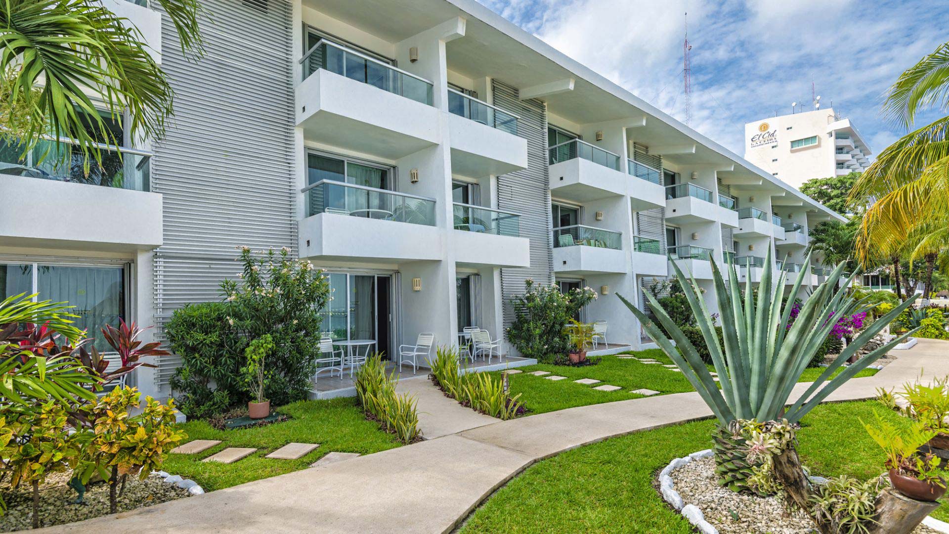 White resort building with walkway